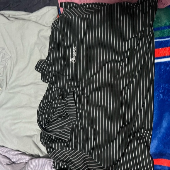 7 Chick-fil-A XL Polos and 1 Men’s grey Chick-fil-A pants - Picture 5 of 5